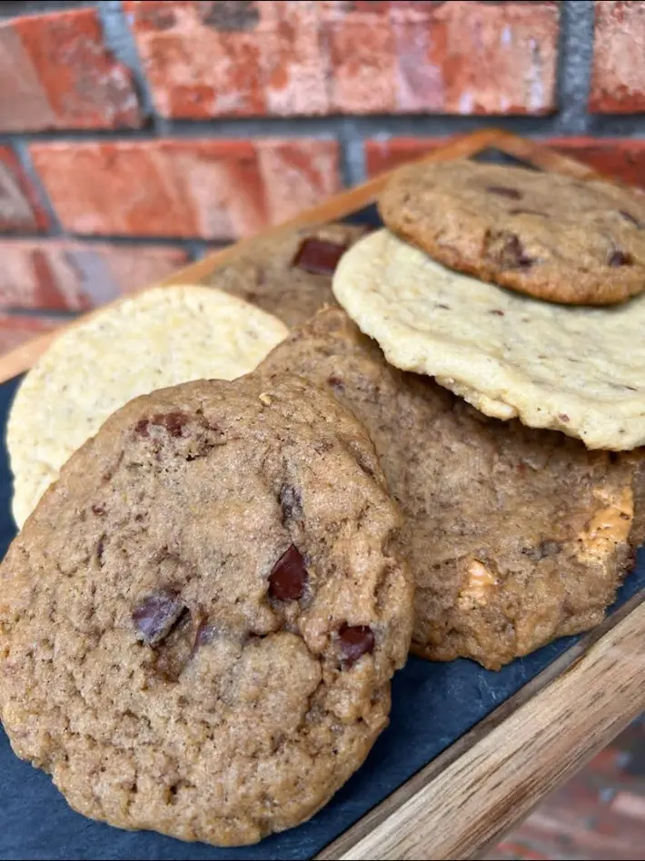 An assortment of fresh plant-based cookies from Mina's Kitchen